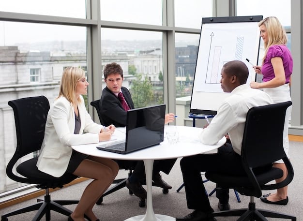 A person confidently presenting a project in a modern office setting, surrounded by colleagues giving positive feedback. The atmosphere is collaborative and supportive, symbolizing career growth and success.