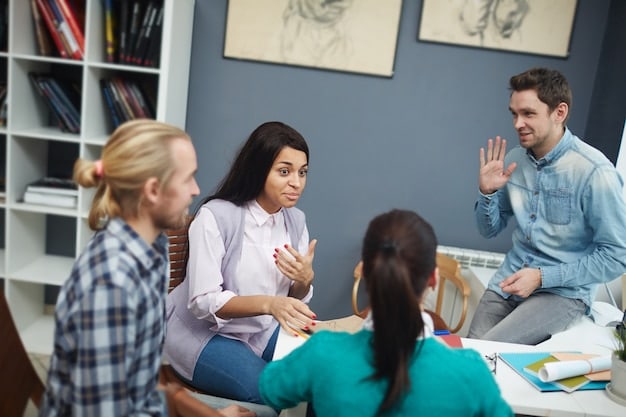 A teacher facilitating a group discussion, encouraging auditory learners to actively participate and share their ideas.