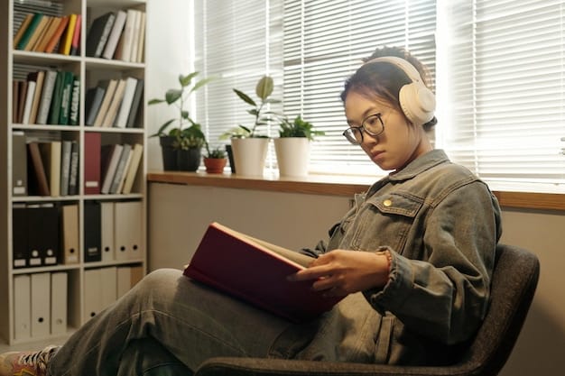An auditory learner studying in a quiet room, listening to a recorded lecture with headphones, while simultaneously taking notes and reading along in a textbook.